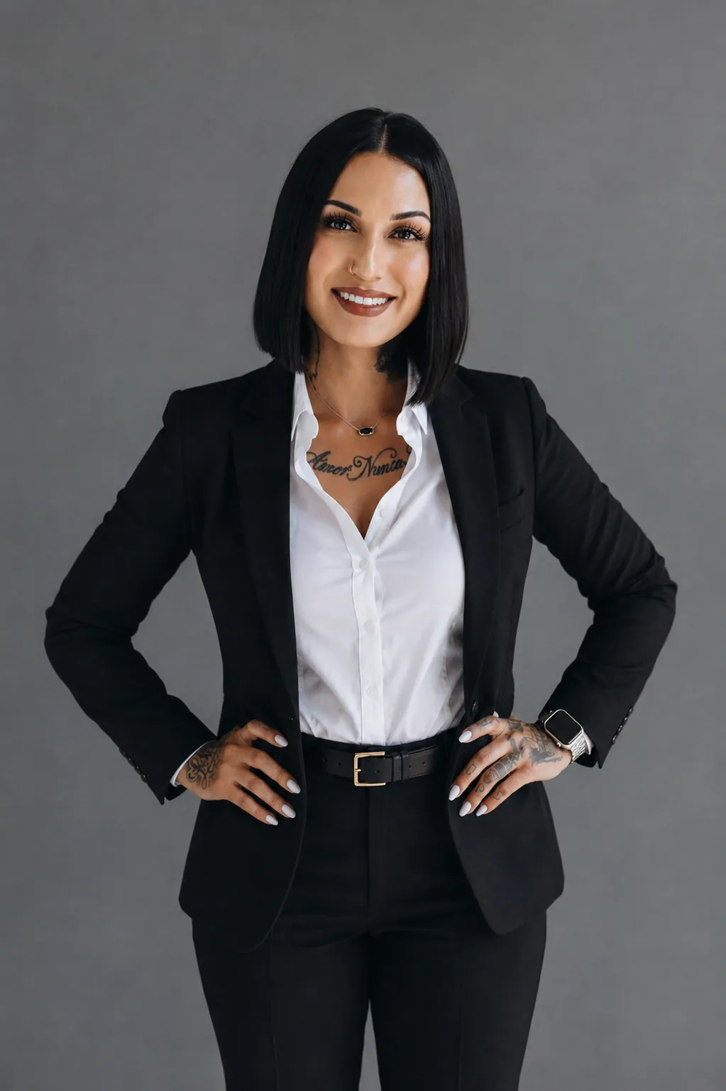 Melissa, founder of Melissa Got Me Right, smiling in a tan blazer
